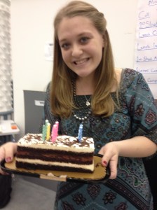 Me at work with the cake my coworker Tony gave me! :)